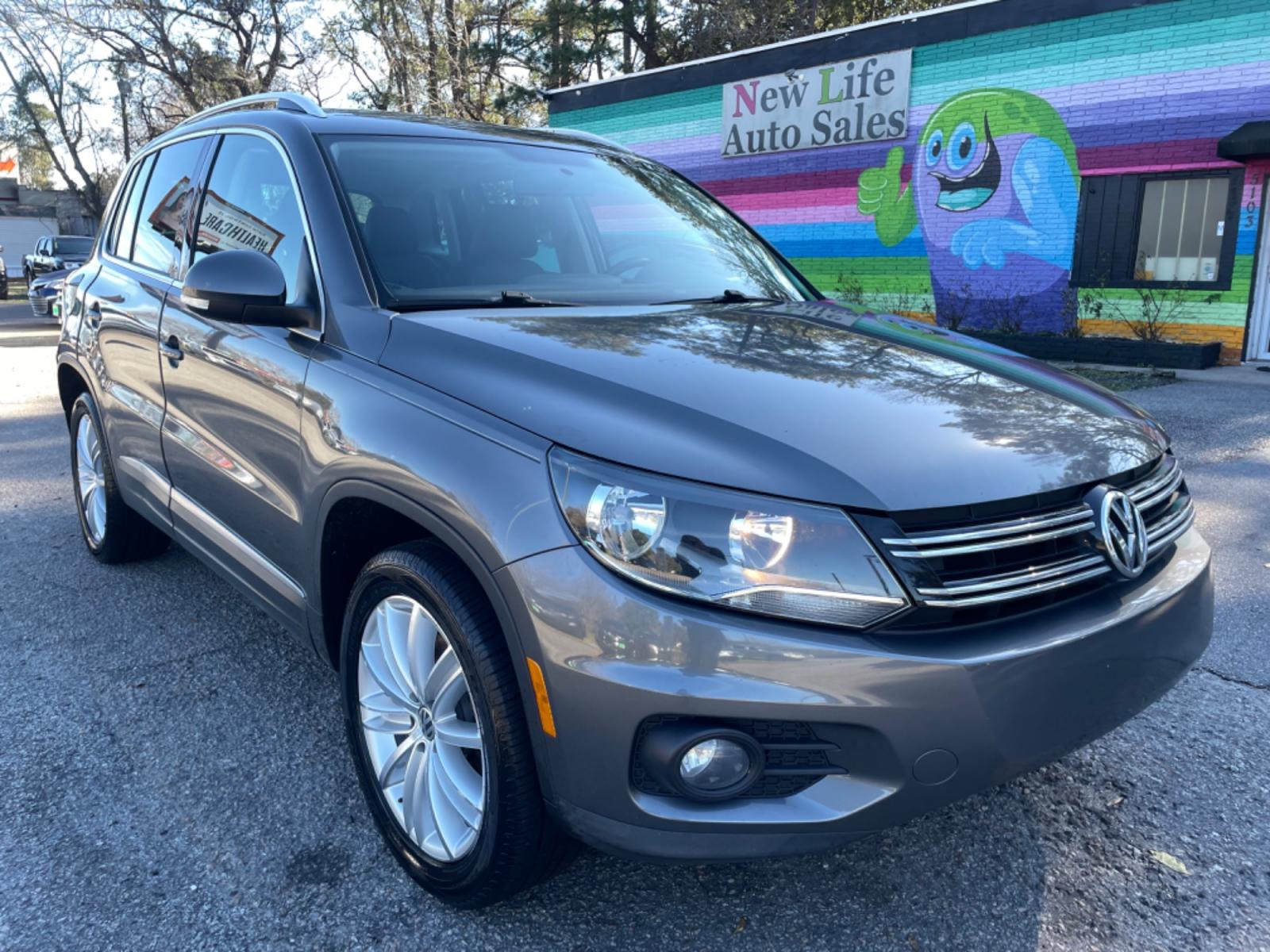 2015 GRAY VOLKSWAGEN TIGUAN S (WVGAV7AX3FW) with an 2.0L engine, Automatic transmission, located at 5103 Dorchester Rd., Charleston, SC, 29418-5607, (843) 767-1122, 36.245171, -115.228050 - Local Trade-in with Leather, Panoramic Sunroof, Navigation, Backup Camera, Fender Stereo with CD/AUX/Bluetooth, Dual Climate Control, Power Everything (windows, locks, seats, mirrors), Heated Seats, Push Button Start, Keyless Entry, Alloy Wheels. Clean CarFax (no accidents reported!) 102k miles Loc - Photo #0